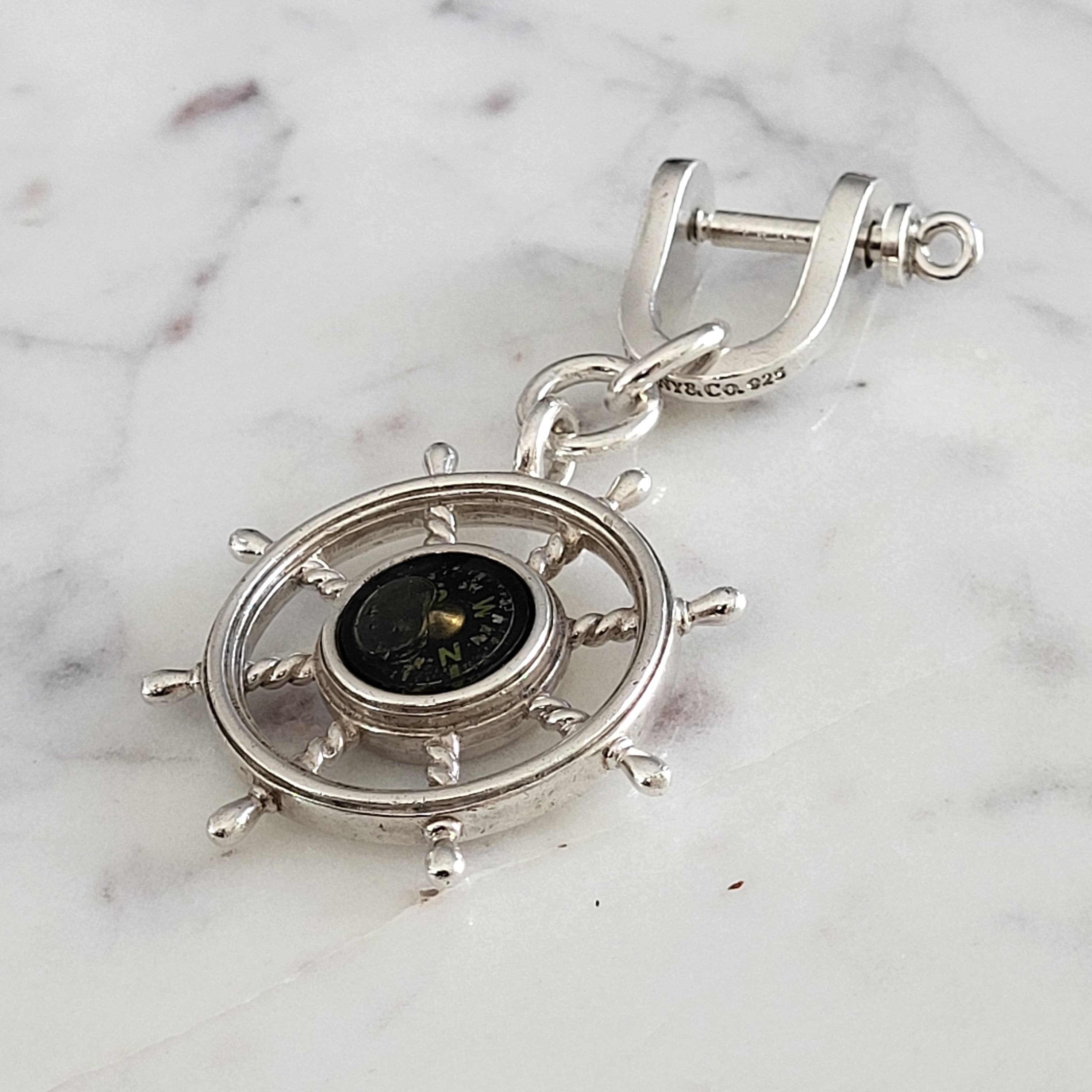 SIlver and Compass Charm with diamond